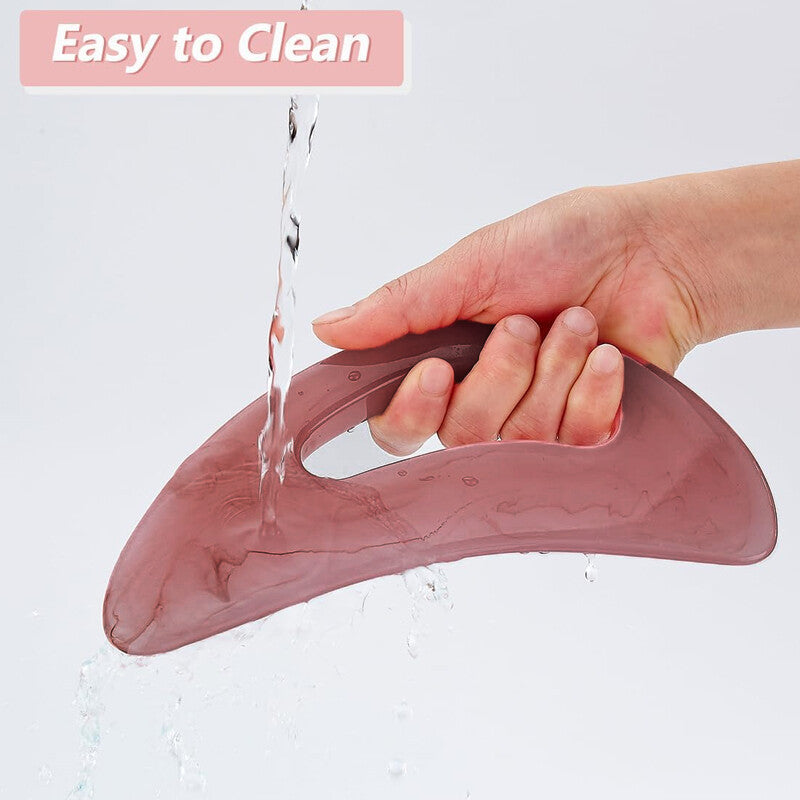 Lymphatic drainage massage tool being glided along the neck